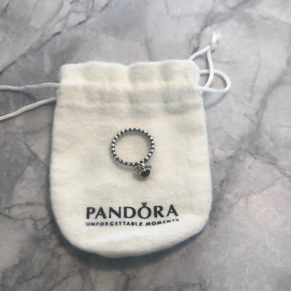 Pandora ring in pouch.
